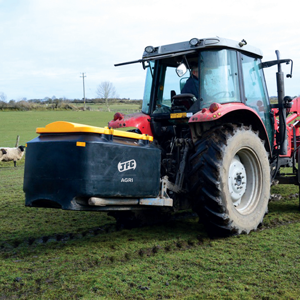 Cubic Meter Meal Bin being transported by tractor