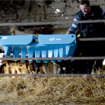 10 Teat Compartment Feeder - EazyFlow Teats hanging off fence