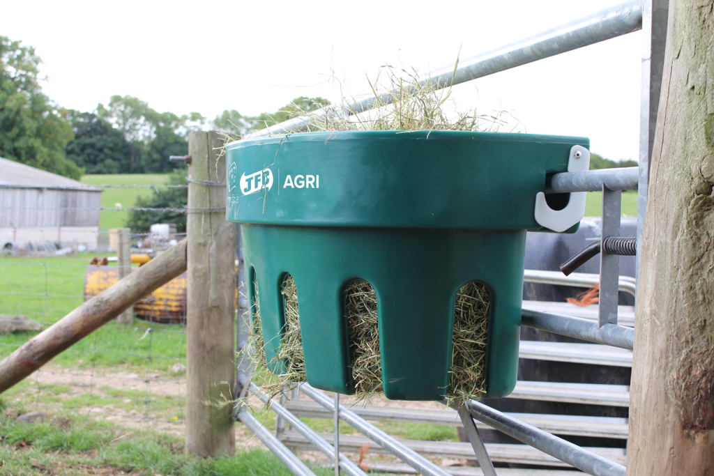 Gate Hay Feeder (Green) filled with hay