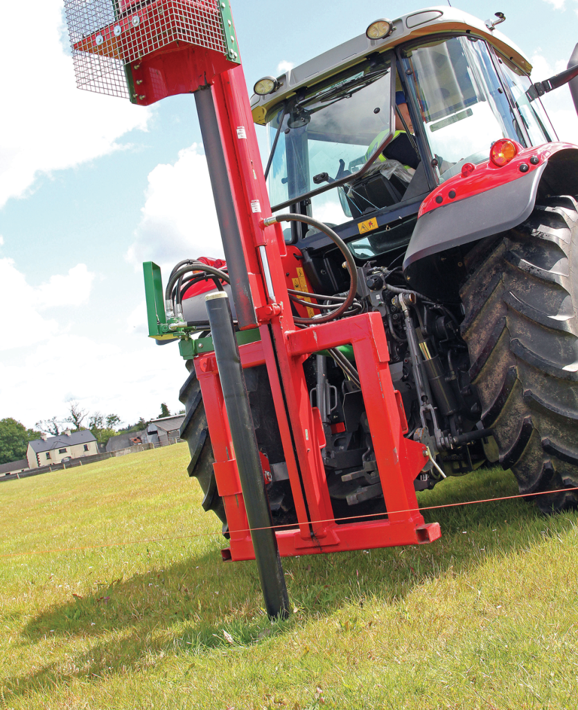 2g polyethylene solid strainer fence post being driven in by tractor